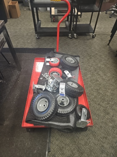 Red cart with assorted wheels 24.5" x 36"