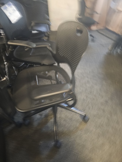 Black office chairs with 5 wheels and back rest