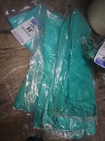Elbow length rubber cleaning gloves sold per pair
