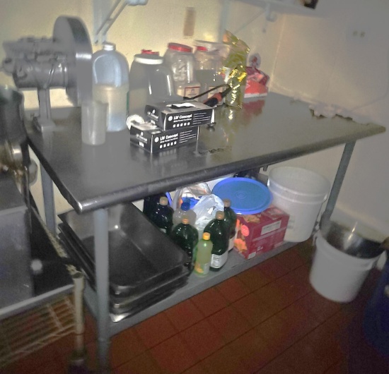 Stainless steel table with vegetable cutter 60" x 30"