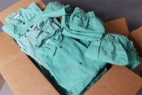 Used welding jackets: one very large box of used, cleaned green welding jac