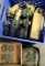Blue plastic crate of air regulators, replacement parts/related
