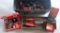 (2) grey plastic toolboxes with (2) Milwaukee 1/2