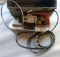Grey plastic toolbox/kit with one Milwaukee Model #6225 porta band saw and