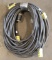 Lot of (4) approx. 25' & 50' black electric extension cords, all with singl
