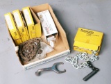 Small cardboard box lot: assortment of tri-stand and other pipe stand vises