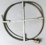 (1) small steel band sewer snake, approx. 20'