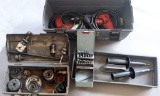 (2) grey plastic toolboxes with (2) Milwaukee 1/2