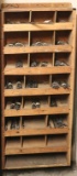 Large wooden pigeonhole drill bit shelf with 21 'holes' of used and some ne