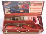 (1) Milwaukee Model 6509 electric Sawzall all in red steel toolbox with ass