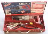 (1) Milwaukee Model 6509 electric Sawzall all in red steel toolbox with ass
