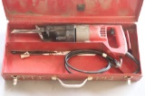 (1) Milwaukee Model 6509 electric Sawzall in red steel toolbox with assorte