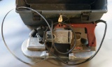 Grey plastic toolbox/kit with one Milwaukee Model #6225 porta band saw and
