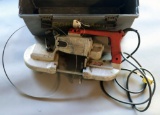 Grey plastic toolbox/kit with one Milwaukee Model #6225 porta band saw and