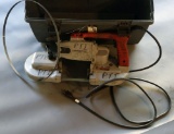 Grey plastic toolbox/kit with one Milwaukee Model #6225 porta band saw and