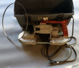 Grey plastic toolbox/kit with one Milwaukee Model #6225 porta band saw and