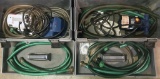 (2) 1/4 HP electric transfer pumps in grey plastic toolbox kits with hoses