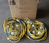 (2) strings NEW in box 50' yellow cord stringer work lights with five cages
