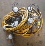 (2) strings 50' each of used yellow cord stringer work lights with cages
