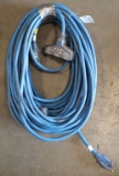 Lot of (2) approx. 50' each blue electric extension cords, both with multi-