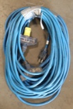 Lot of (2) approx. 50' each blue electric extension cords, both with multi-