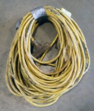 Lot of (3) approx. 50' each yellow extension cords: (1) multi-port, (2) sin