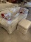 White sofa with pillows and ottoman