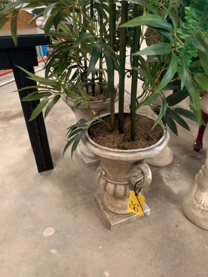 Pair of planters with artificial shrubs