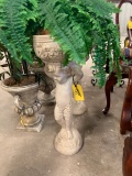 Pair of cherub planters with artificial plants