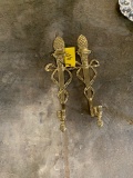 Pair of gold candle holders