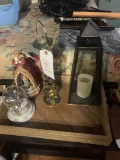tray of decorative pieces and galileo thermometer
