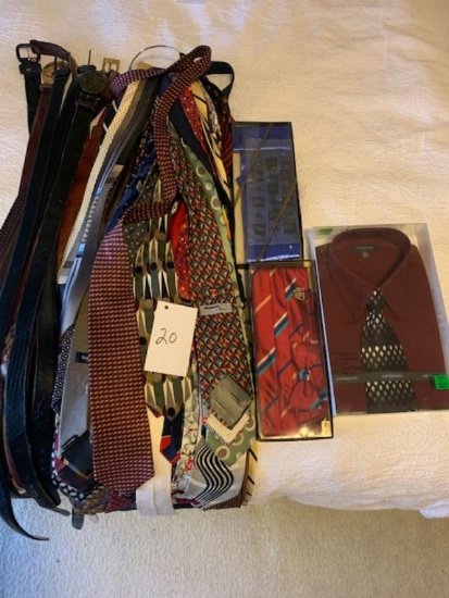 large rack of belts and ties