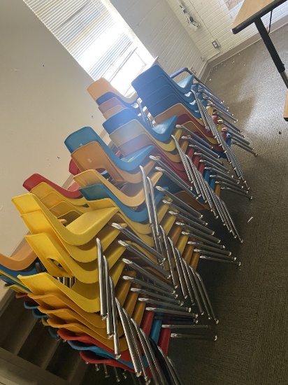 LARGE LOT OF COLORED STACKING CHAIRS