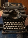 VERY OLD ROYAL MANUAL TYPEWRITER AND OLD NEWSPAPER