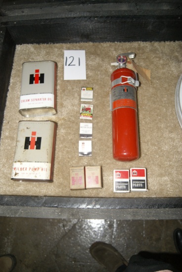 DISPLAY OF OIL CANS / FIRE EXTINQUISER AND MATCHES