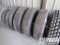 (4) 11R-24.5 Highway Tires (UNUSED) w/ Steel Budds