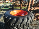 10-16.5 Skid Steer Tires on Bobcat Rims