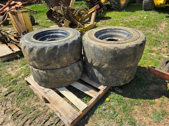 4-12-16.5 Foam Filled Tiber Skidloader Tires & 8 Lug Rims