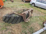 Skidloader Tire Scraper