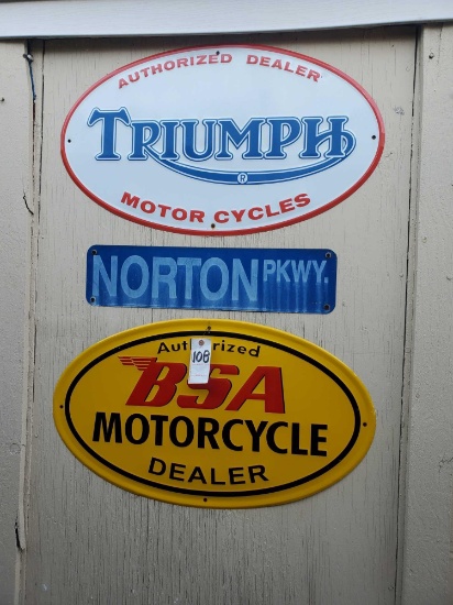 3 Metal Signs on wall