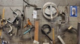 Specialty tools on pegboard wall