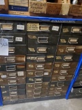 cabinet full of new and used Triumph parts