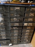 cabinet full of new and used Triumph parts