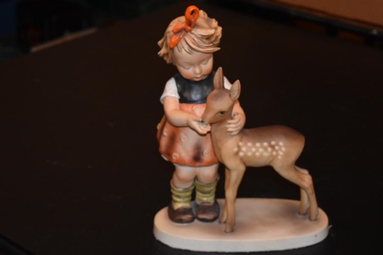 Girl with deer signed and dated Hum 136\V