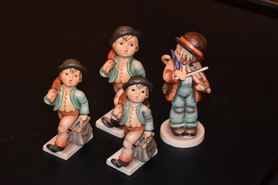 Three Merry travelers Hummel figurines and one boy fiddler