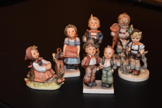 Six Hummel figurines