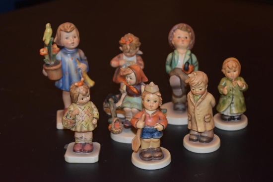 Eight Hummel figurines