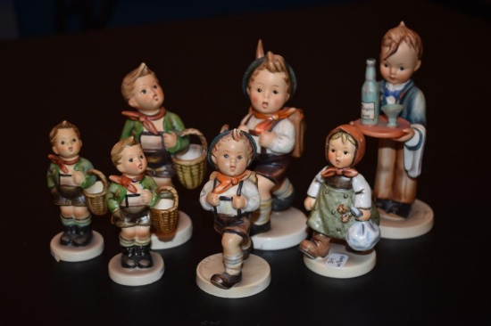Seven small Hummel figurines one with box