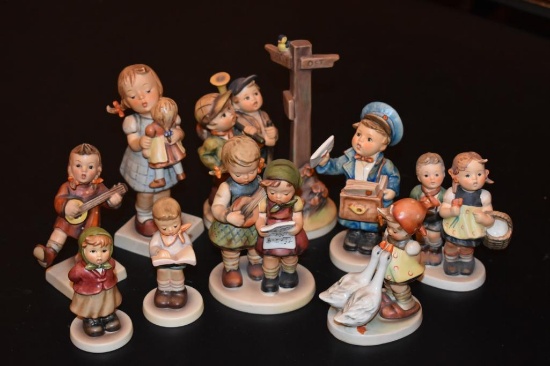 9 Vintage Hummel figurines including two boys at border of East West HUM331 signed from 1955