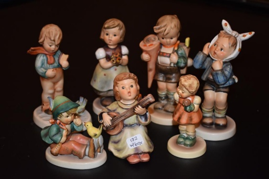 Tray lot of seven Hummel figurines